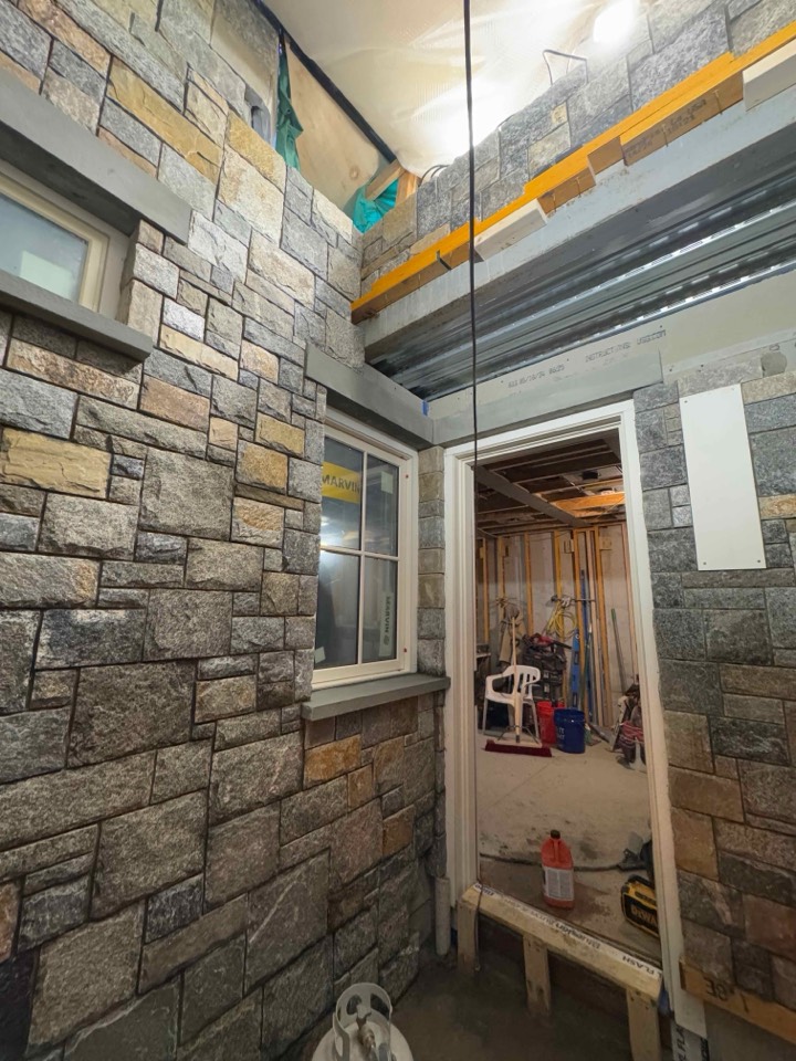 Interior room finished in full stone veneer