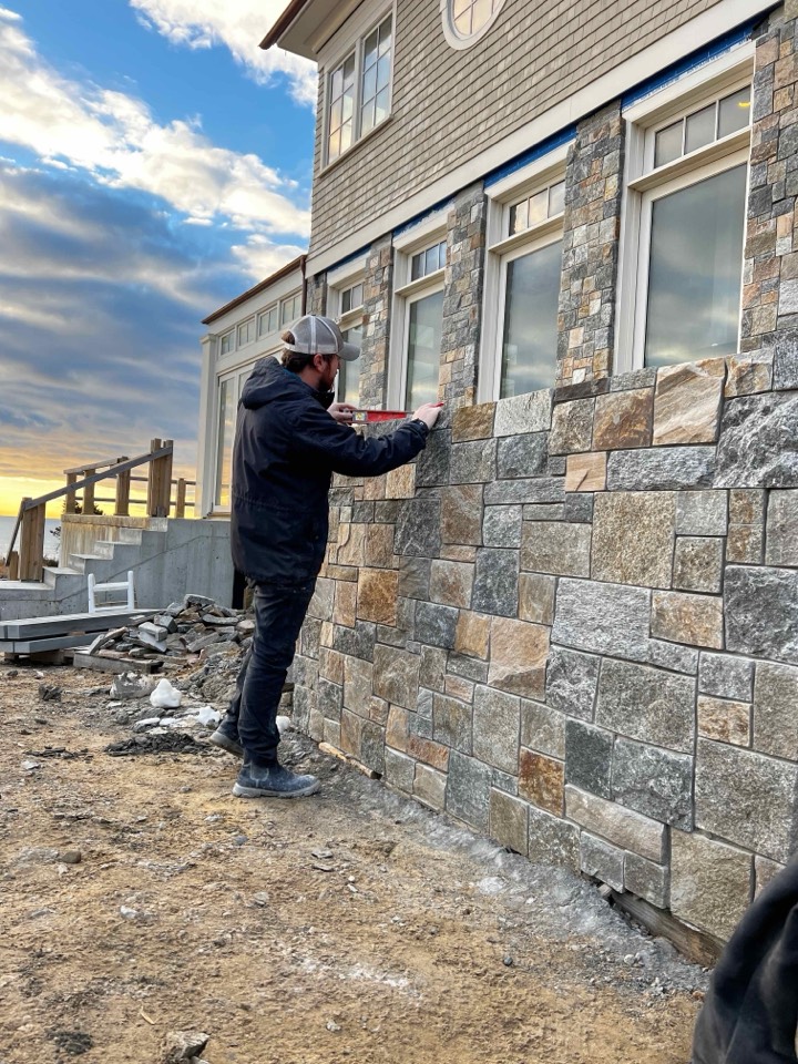 Stone veneer facade at sunset on the New Hampshire coast